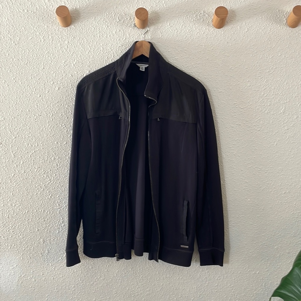 Men’s Calvin Klein zip up. Black. Size large. Cable knit material.